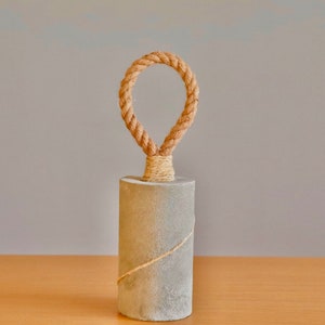 Heavy door stopper with rope, concrete door holder, skandi doorstopper
