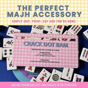 May include: A pink and white card with the text "Crack Dot Bam" in blue. The card has instructions for playing a game of Mahjong, including rules for using a joker and the different types of dragons. The card is surrounded by Mahjong tiles.