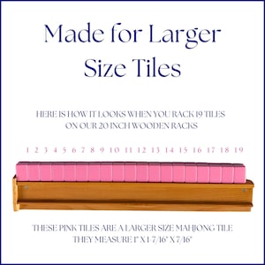 May include: A wooden rack displays 19 pink Mahjong tiles. The tiles measure 2.54cm x 3.65cm x 1.11cm. The image text reads "Made for Larger Size Tiles".