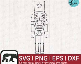 May include: A black and white line art illustration of a nutcracker soldier. The nutcracker is standing with its arms at its sides and has a star on its hat. The image includes the text "SVG | PNG | EPS | DXF Commercial Use For Physical Products".