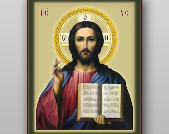 May include: An icon of Jesus Christ, framed in red and green. Jesus is depicted with long brown hair and a beard, wearing a red robe and blue cloak. He holds an open book with text and has a golden halo. The background is a light yellow.