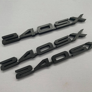 1x 240sx Emblem schwarz Kunststoff Zierrahmen für Kosmetik