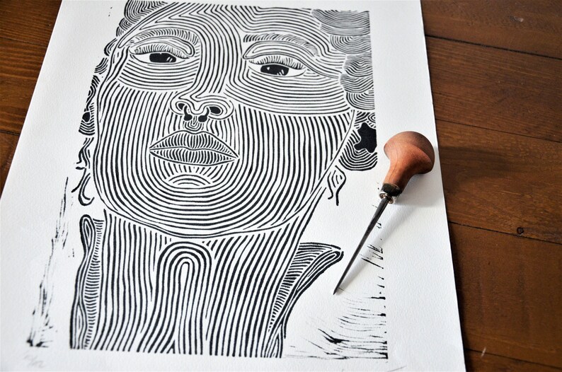 limited to the Din A3 Woman with Piercing Original linocut print