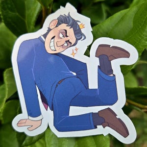 May include: A sticker featuring a cartoon illustration of a man in a blue suit, bent over with a surprised expression. The sticker has a white border and is set against a backdrop of green leaves.