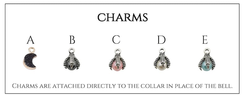 May include: Five different charms for a dog collar. The charms are in the shape of a crescent moon, a paw print, and three different colored pearls. The charms are labeled A, B, C, D, and E. The text "CHARMS ARE ATTACHED DIRECTLY TO THE COLLAR IN PLACE OF THE BELL." is below the charms.