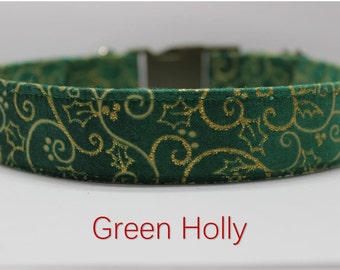 May include: Green and gold dog collar with a holly leaf and swirl pattern.