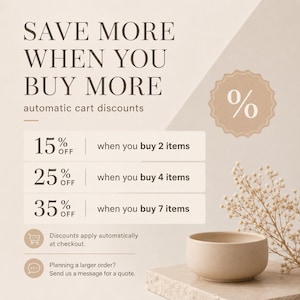 May include: A beige graphic advertisement stating SAVE MORE WHEN YOU BUY MORE with automatic cart discounts of 15% off for 2 items, 25% off for 4 items, and 35% off for 7 items. A small beige bowl and dried flowers are visible in the corner.