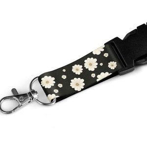 Fleurs imprimer lanière sur un fond noir avec clip de sécurité et porte-cartes noires 20mm