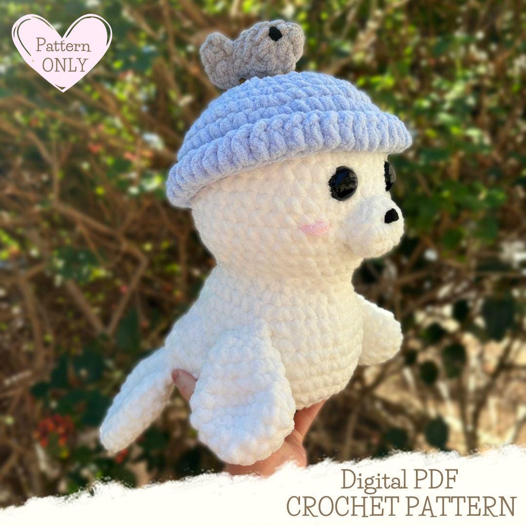 39 Seal Crochet Patterns for Ocean-Themed Amigurumi, Gifts, and Cozy Decor 34 Seal with Fish Hat Crochet