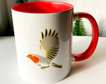 coffee mug showing a robin in flight