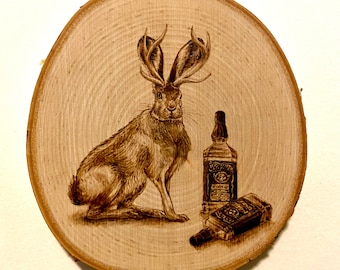 Jackalope Cryptid Woodburned pyrography - A Jackalope’s Favorite Drink is Whiskey