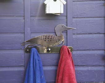 Steel loon towel rack