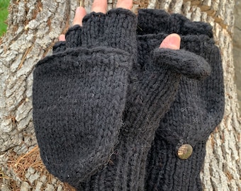 May include: Black fingerless gloves with a fold-over cuff and a brown leather tag that says "ALTRA".