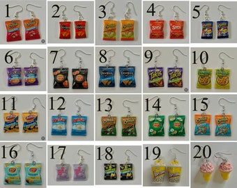 May include: Twenty pairs of dangle earrings featuring miniature replicas of popular snack food bags. The earrings are silver-toned and feature a variety of popular brands, including Cheetos, Doritos, Lays, Sun Chips, Takis, Fritos, Ruffles, and more.