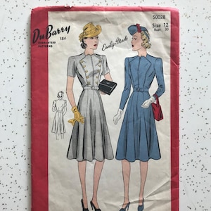 May include: Vintage sewing pattern for a dress, featuring two women wearing dresses with a fitted bodice and a full skirt. The pattern is from the Du Barry line and is labeled "Easily-Made" and "Size 12, Bust 30".