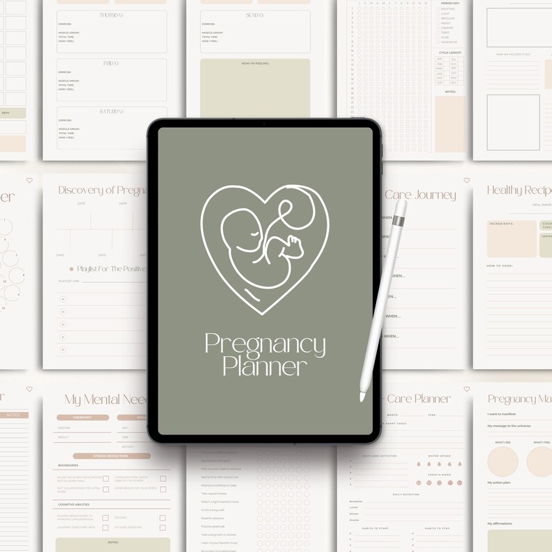 May include: A digital pregnancy planner displayed on a tablet, surrounded by printed pages. The tablet features a heart-shaped logo with a fetus outline and the words "Pregnancy Planner." A white stylus rests on the tablet.