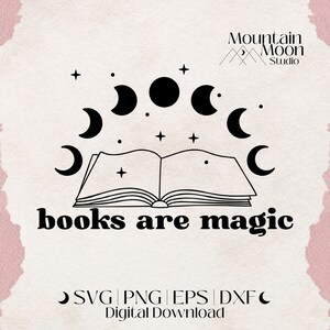 May include: Black and white illustration of an open book with crescent moons and stars around it. The text "books are magic" is below the book. The text "Mountain Moon Studio" is in the top right corner of the image.