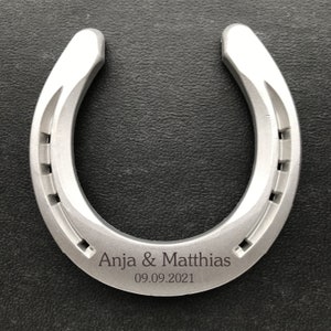 Inscribe lucky horseshoe with text