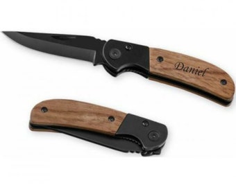 black folding knife made of stainless steel with your personal desired engraving