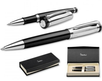 Writing set with personalized engraving with a ballpoint pen and a metal roller pen
