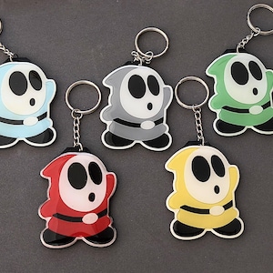 Shy Guy Ghost Keychain from Nintendo Super Mario Games in Multiple Colors - Cute Keychain Retro Tag Lanyard Gift 80s Video Game