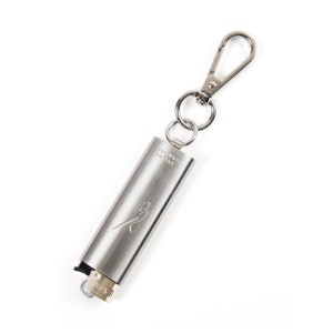 May include: A silver lighter keychain with a Frankie Smoke logo and a silver carabiner clip.