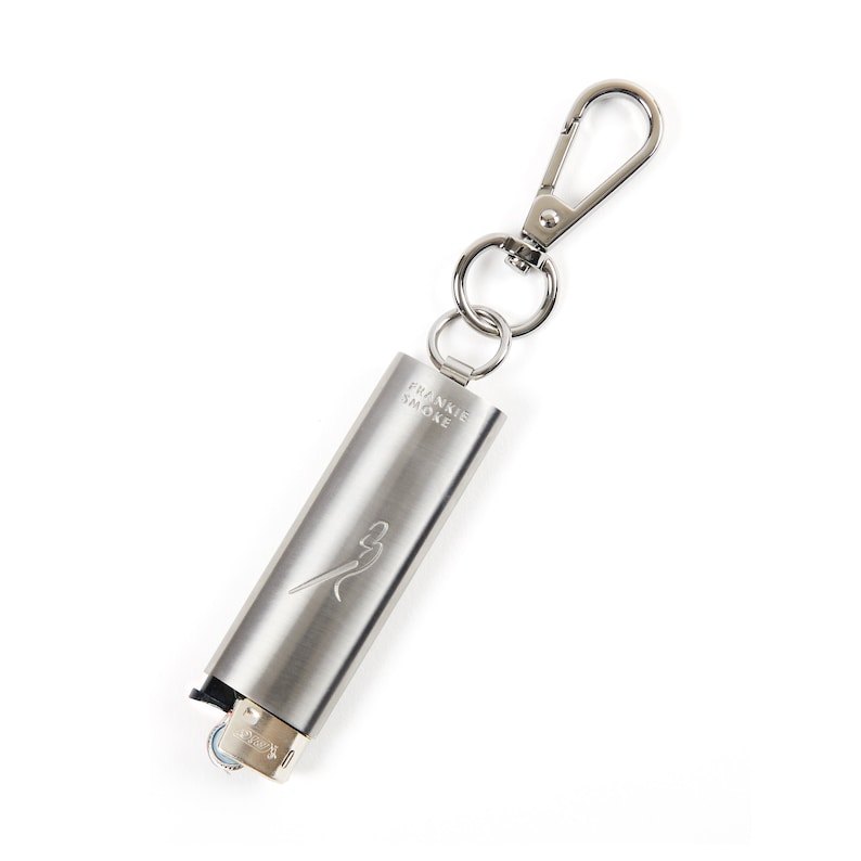 May include: A silver lighter keychain with a Frankie Smoke logo and a silver carabiner clip.