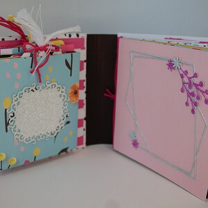 Album with tag pockets and pages