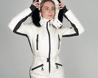 Women's ski suit made of waterproof ivory fabric with black inserts