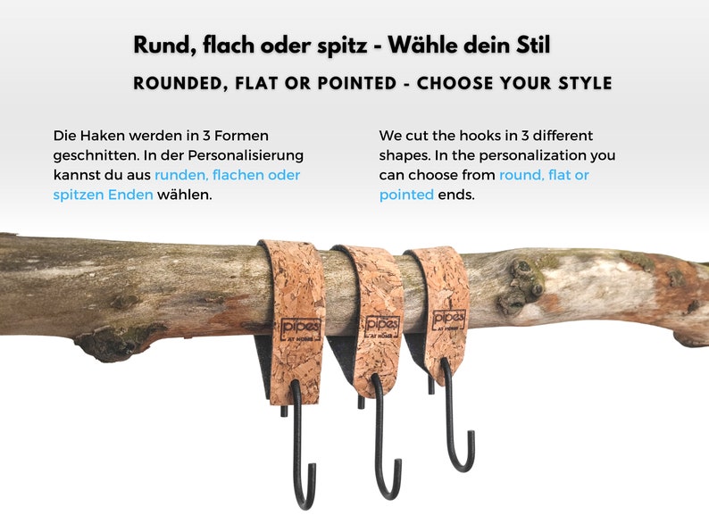 Pu&ograve; includere: Tre ganci rivestiti in sughero con ganci in metallo in stili arrotondati, piatti e appuntiti. I ganci sono attaccati a un ramo. Il testo "pipes" &egrave; stampato sul sughero.
