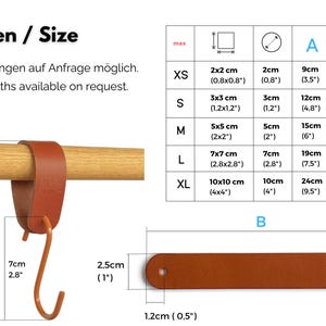 May include: A brown leather hook with an orange metal hook, shown attached to a wooden rod. The image includes a size chart with measurements in inches and centimeters, and the text "Gr&ouml;&szlig;en / Size". The hook is 2.8 inches (7cm) long.