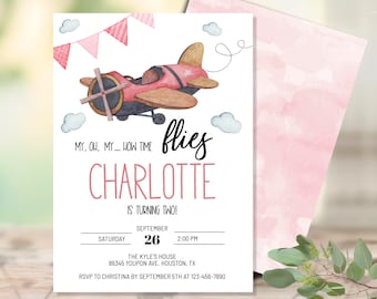 May include: A pink and white invitation with a watercolor illustration of a red airplane with a white star. The text reads "My, oh, my... how time flies Charlotte is turning two!"  September 26, 2:00 PM. The Kyle's House, 86345 Youpon Ave. Houston, TX. RSVP to Christina by September 5th at 123-456-7890.