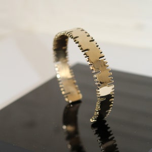 Cut-out brass bracelet