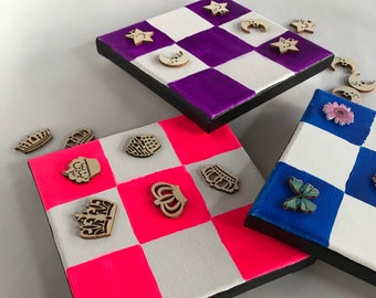 Tic-Tac-Toe Board with Fun Playing Pieces! Great gift basket stuffer! A new twist on an old game.