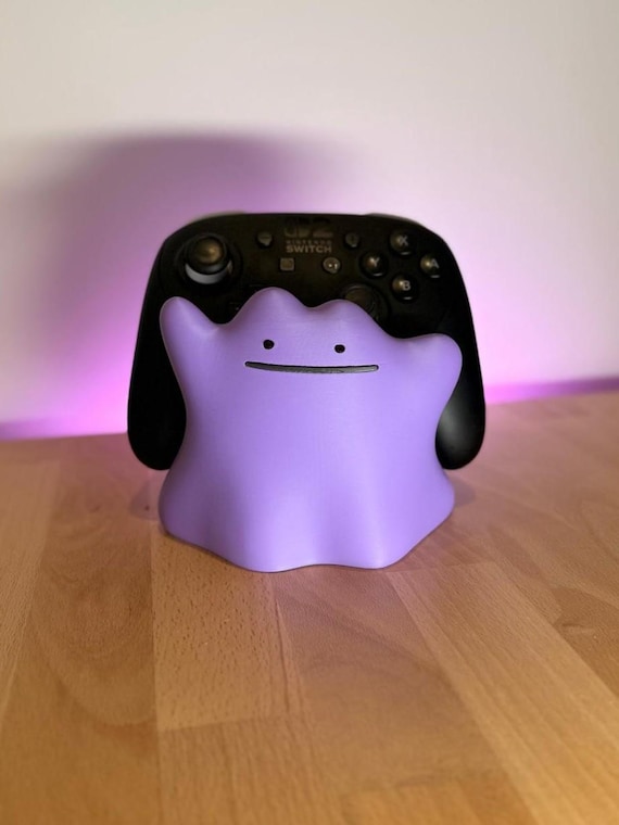 Support de manette Métamorph (Ditto) – Pokopia -  Support gaming Pokémon – Compatible Switch, PS5, Xbox