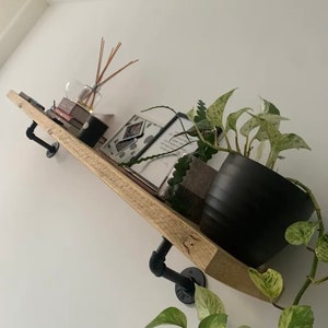 Kitchen shelf pipe supports