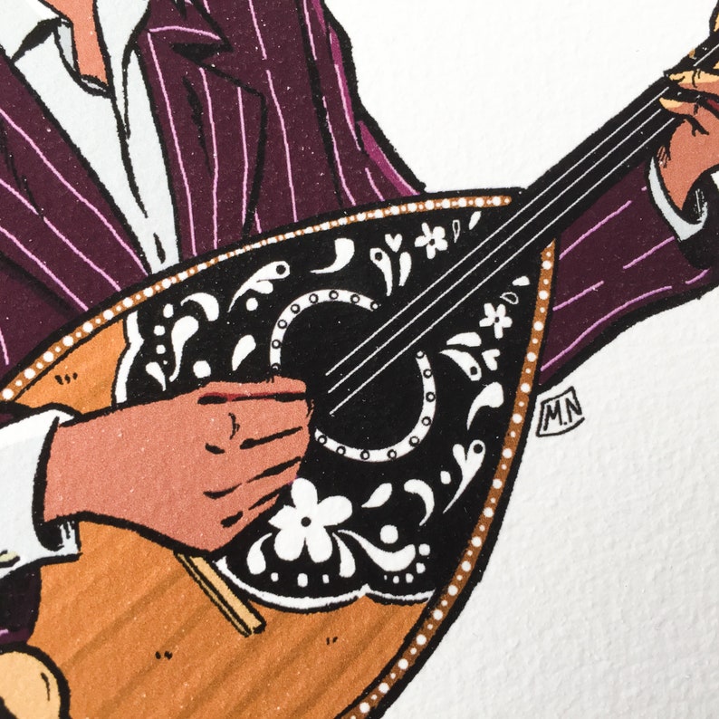 May include: A close-up of a person playing a black and white bouzouki with intricate floral designs. The bouzouki has a brown wooden body and a black neck. The person's hand is on the neck of the instrument, and their fingers are pressing down on the strings.