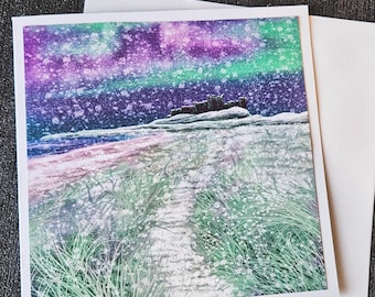 Northern Lights Card: Snowy Bamburgh Castle, Northumberland Landscape Christmas card