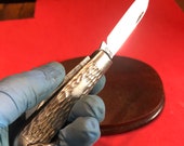 Vintage antique jack knife pocket knife from colonial Providence Rhode Island USA bare tin shell handle