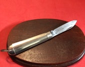 Vintage antique jack knife pocket knife with bare polished tin handles
