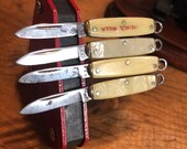 Vintage antique tiny version of real slip joint snap action Pocket Knives made to be used as an pendant, keychain or charm