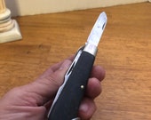 Vintage Electricians pocket knife by Camillus with rubberized handle