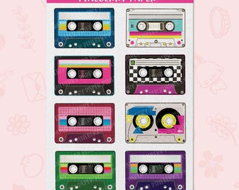 May include: A sheet of stickers featuring colorful cassette tape designs. The stickers include various colors like blue, pink, green, and purple, with details such as the cassette tape labels and the Pineberry Paper logo. The text "CASSETTE PINEBERRY PAPER" is at the top.