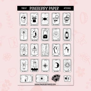 May include: A sheet of tarot card stickers with black line art on a light pink background. The cards feature illustrations and titles like "The Fool," "The Magician," and "The Lovers." The text "TAROT PINEBERRY PAPER" is at the top.