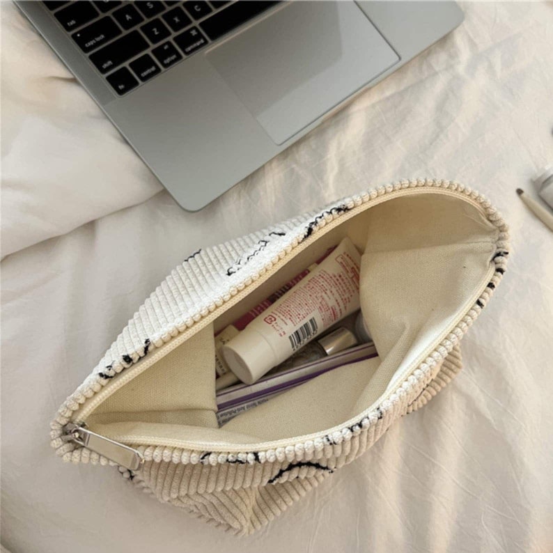 •SUN FACE• corduroy makeup bag