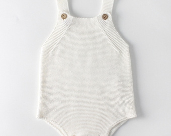 Cream knitted romper with rustic buttons