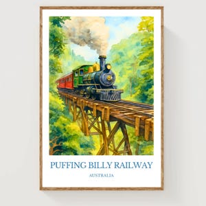 May include: Watercolor painting of a vintage steam train, green and black, with a red passenger car, crossing a wooden trestle bridge. The artwork is set against a backdrop of lush green trees and a blue sky. The text "PUFFING BILLY RAILWAY AUSTRALIA" is at the bottom.