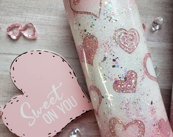 Vaso de corazones rosados