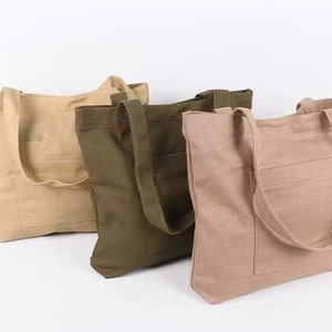 Strapazierfähige Canvas-Tasche mit mehreren Taschen, minimalistische ästhetische Tasche mit Vordertasche, warme beige leichte Büchertasche, tolles Geschenk für Sie