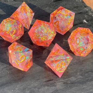 Faerie Fire- Shining Multifaceted Sharp Edge Dice Set- Rose Pink with Iridescent Foil Inclusions - 7 pc with Gold Numbering -DnD, TTRPGs